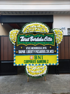 Papan Bunga Duka di Tomuan