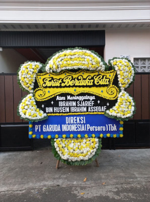 Papan Bunga Duka di Tomuan