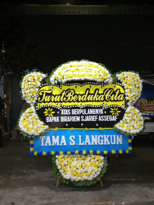 Papan Bunga Duka di Tomuan