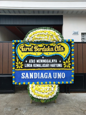 Papan Bunga Duka di Tomuan