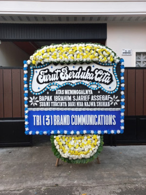 Papan Bunga Duka di Tomuan